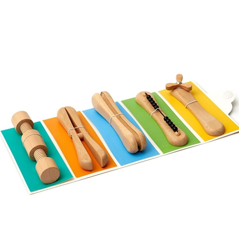 Set of wooden toys on a colorful tray for fidgeting