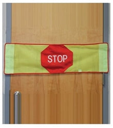 Door with a red 'STOP' alarm door barrier 