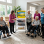 Caregiver with Sunshine Cart in bright community room