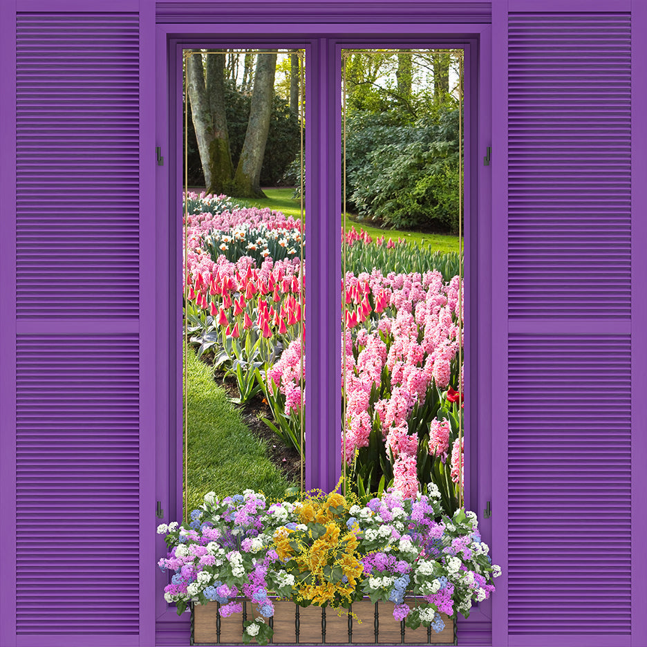 Purple shutters open to reveal a garden with pink tulips and a wooden planter of flowers.