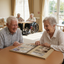 Seniors with Photo Album in Bright LTC Rec Room with Windows