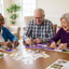 Three multicultural seniors playing Match It game