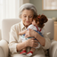Senior woman holding Dorothy Therapy Doll for Dementia and calming